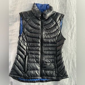 Women’s small down, zippered vest - black with bright blue interior